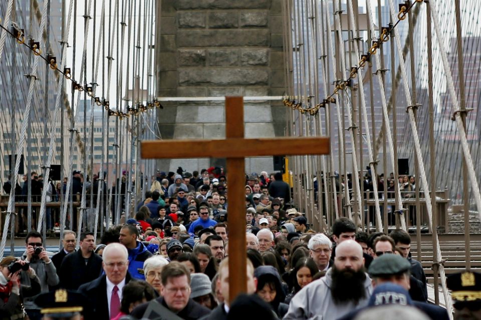 People participate in the Way of the Cross over the Brooklyn Bridge in New York April 18, 2014. (CNS/Reuters/Eduardo Munoz) People participate in the Way of the Cross over the Brooklyn Bridge in New York April 18, 2014. (CNS/Reuters/Eduardo Munoz)