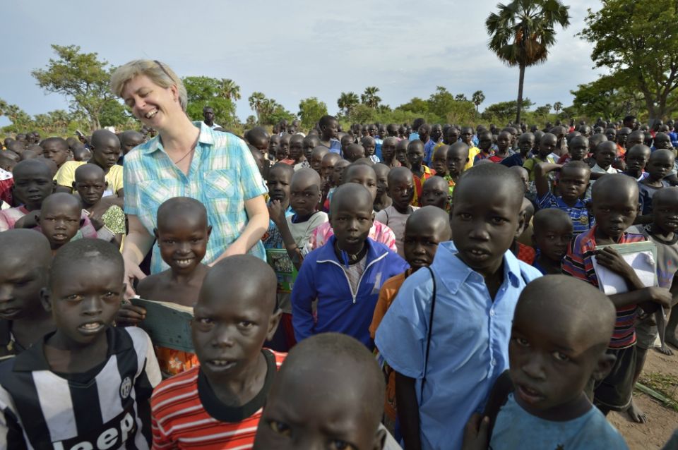 Loreto Sr. Orla Treacy laughs as she talks with students in the Loreto Primary School in Rumbek, South Sudan. (Paul Jeffrey)