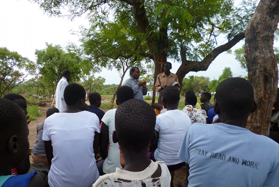 A catechist assists Salesian Fr. Lazar Arasu in preparing young people for First Holy Communion in 2019. (Courtesy of Lazar Arasu) A catechist assists Salesian Fr. Lazar Arasu in preparing young people for First Holy Communion in 2019. (Courtesy of Lazar Arasu)