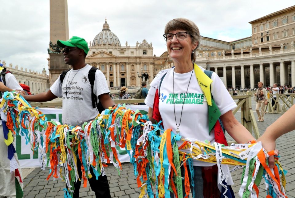 Pilgrims of Catholic environmental movements are seen Oct. 4, 2018, at the start of the climate walk in St. Peter's Square at the Vatican. (CNS/Reuters/Tony Gentile)