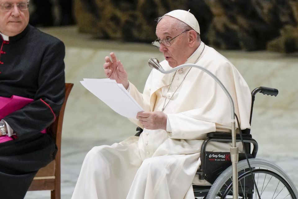 Pope Francis in a wheelchair delivers his address during an audience with members of the Italian Civil Aviation Authority in the Paul VI Hall at the Vatican May 13. (AP/Andrew Medichini)