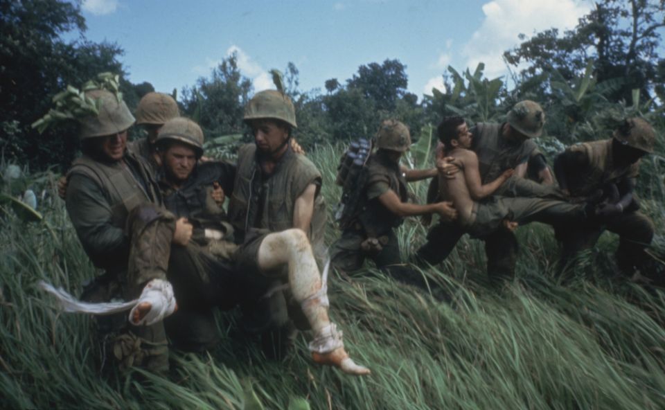 Marines carrying their wounded during firefight near the DMZ, 1966. (PBS/Courtesy of Getty Images/Larry Burrows) Marines carrying their wounded during firefight near the DMZ, 1966. (PBS/Courtesy of Getty Images/Larry Burrows)