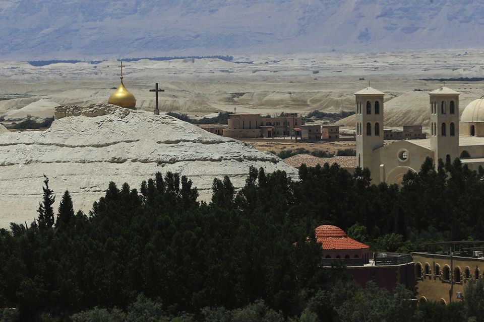 Buildings stand at Al-Maghtas, known as Bethany Beyond the Jordan, on the east bank of the Jordan River in Jordan on June 8. (AP/Raad Adayleh)