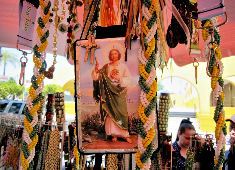 Merchants bring St. Jude Thaddeus imagery from Mexico City to sell outside of the iconic church named for him in Guadalajara, Mexico. (Stephen Woodman)