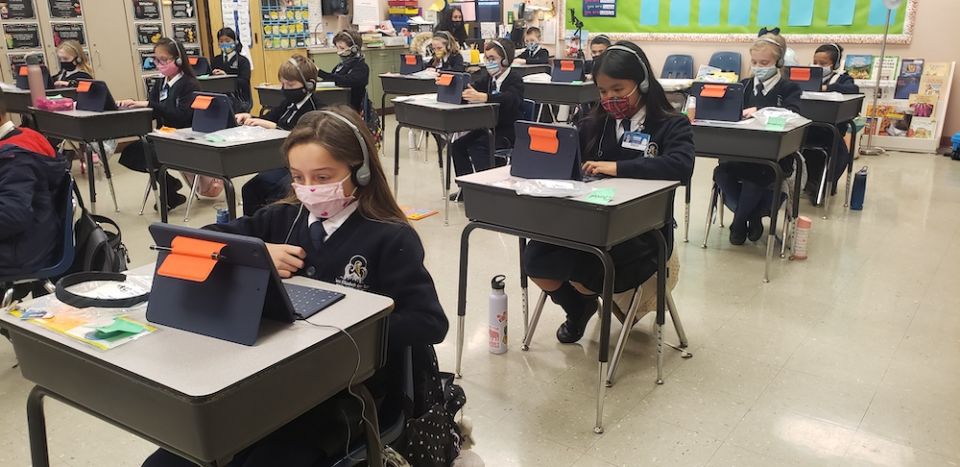 Students do work on tablets at St. Elizabeth Ann Seton School in Las Vegas.  Despite an unprecedented drop in enrollment nationwide, Catholic schools in Las Vegas grew by 5.5% last year. (Courtesy of the Las Vegas Diocese)