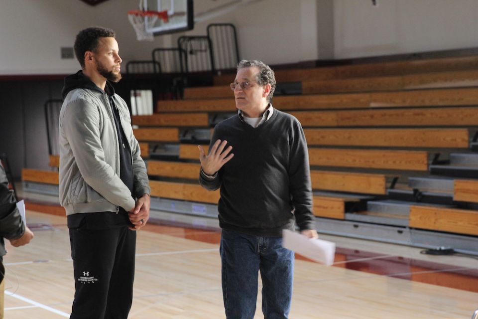 Golden State Warrior basketball player Stephen Curry, left, talks with documentarian Jonathan Hock on the set of "Benedict Men." (Quibi/Whistle Studios/Dennis Lisberger)
