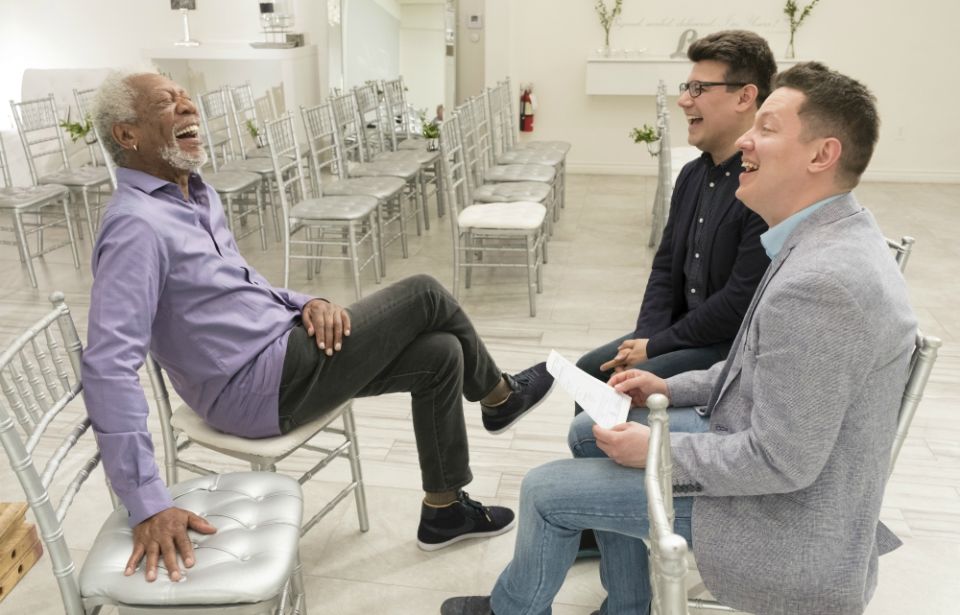 Morgan Freeman laughs with Russian couple Oleg Dusaev and Dmitry Stepanov in "The Story of Us." (National Geographic/Justin Lubin)