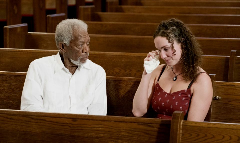 Morgan Freeman meets with Megan Phelps-Roper, former Westboro Baptist Church social media manager, who explains how she turned her back on the church and its rhetoric of hate.  (National Geographic/Justin Lubin)