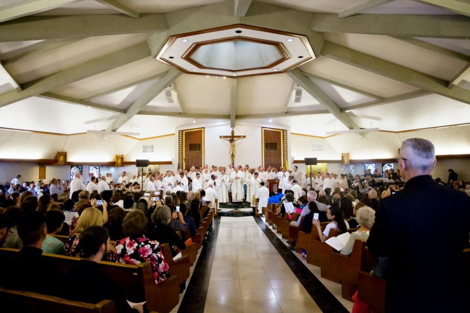 The ordination Mass for the Jesuits' West Province is celebrated June 9 at Our Lady of Mount Carmel Parish in San Ysidro, California. (Jon Rou)