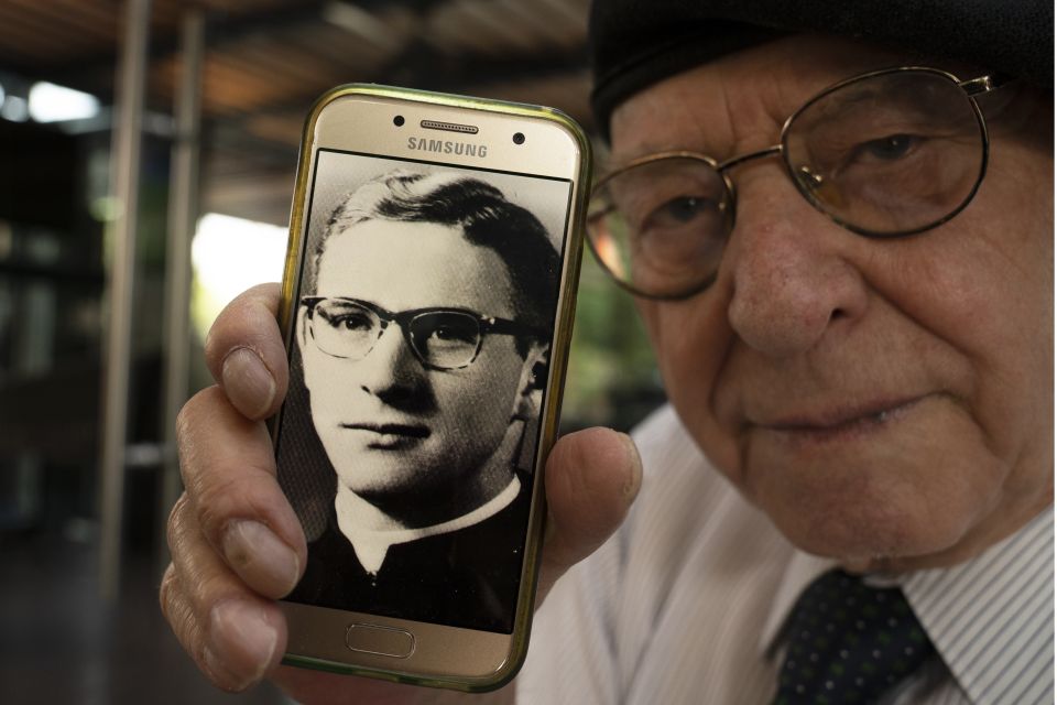 Jose Barba shows a photo of himself when he was a 18-year-old seminarian student, Mexico City, Feb. 22, 2022. (AP Photo/Marco Ugarte) Jose Barba shows a photo of himself when he was a 18-year-old seminarian student, Mexico City, Feb. 22, 2022. (AP Photo/Marco Ugarte)