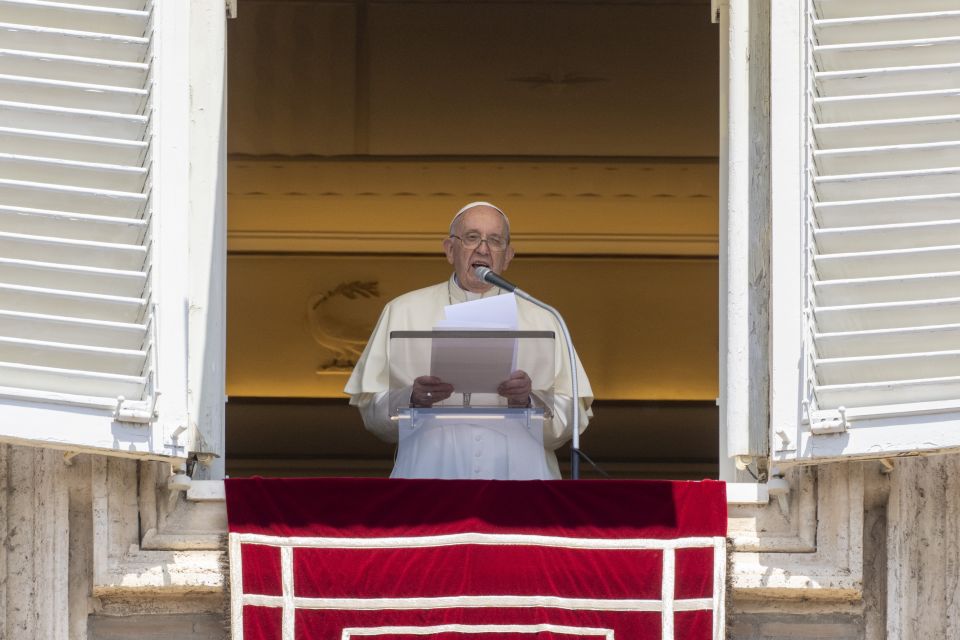 Pope Francis delivers his blessing as he recites the Regina Coeli noon prayer from the window at the Vatican, Sunday, May 22, 2022. (AP Photo/Andrew Medichini)