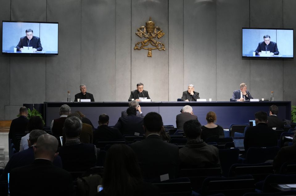 From left, Professor Gianfranco Ghirlanda, Mons. Marco Mellino, Cardinal Marcello Semeraro, and Vatican's spokesman Matteo Bruni, attend the presentation of the long-awaited reform program of the Holy See bureaucracy, during a press conference at the Vati From left, Professor Gianfranco Ghirlanda, Mons. Marco Mellino, Cardinal Marcello Semeraro, and Vatican's spokesman Matteo Bruni, attend the presentation of the long-awaited reform program of the Holy See bureaucracy, during a press conference at the Vati