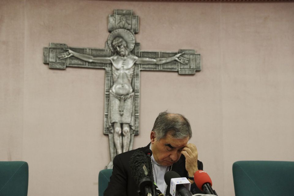 Cardinal Angelo Becciu talks to journalists during press conference in Rome, in this Friday, Sept. 25, 2020. (AP Photo/Gregorio Borgia) Cardinal Angelo Becciu talks to journalists during press conference in Rome, in this Friday, Sept. 25, 2020. (AP Photo/Gregorio Borgia)