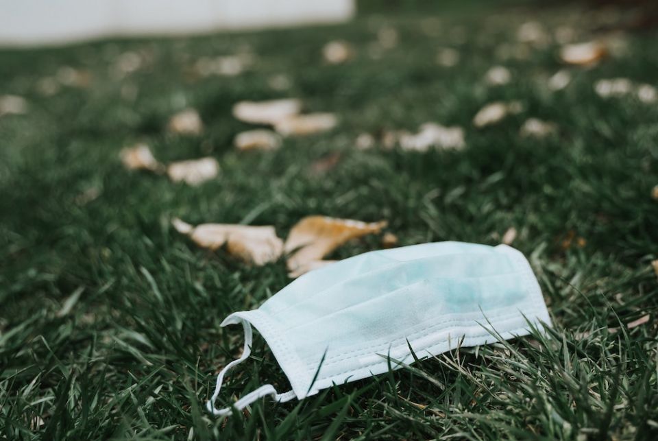 The grieving about the loss of normalcy, whatever that actually means, may be misplaced since there were plenty of things before this pandemic that should have been discarded long ago. (Unsplash/Tatiana Rodriguez) Discarded face mask on lying on the grass
