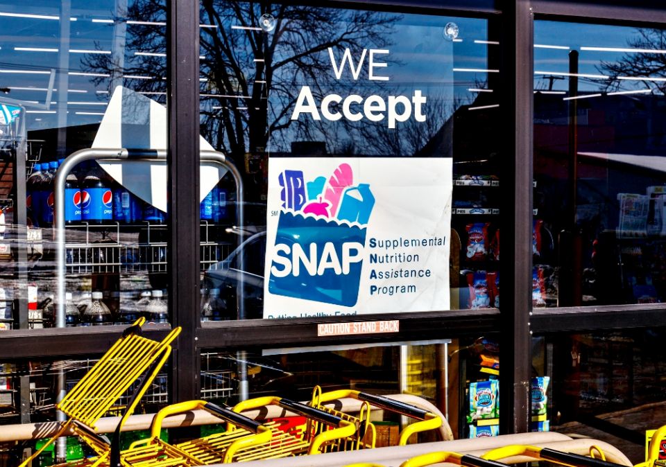 A sign announces that a retailer accepts the Supplemental Nutrition Assistance Program, or SNAP (formerly known as food stamps), in Muncie, Indiana, in January. (Dreamstime/Jonathan Weiss)