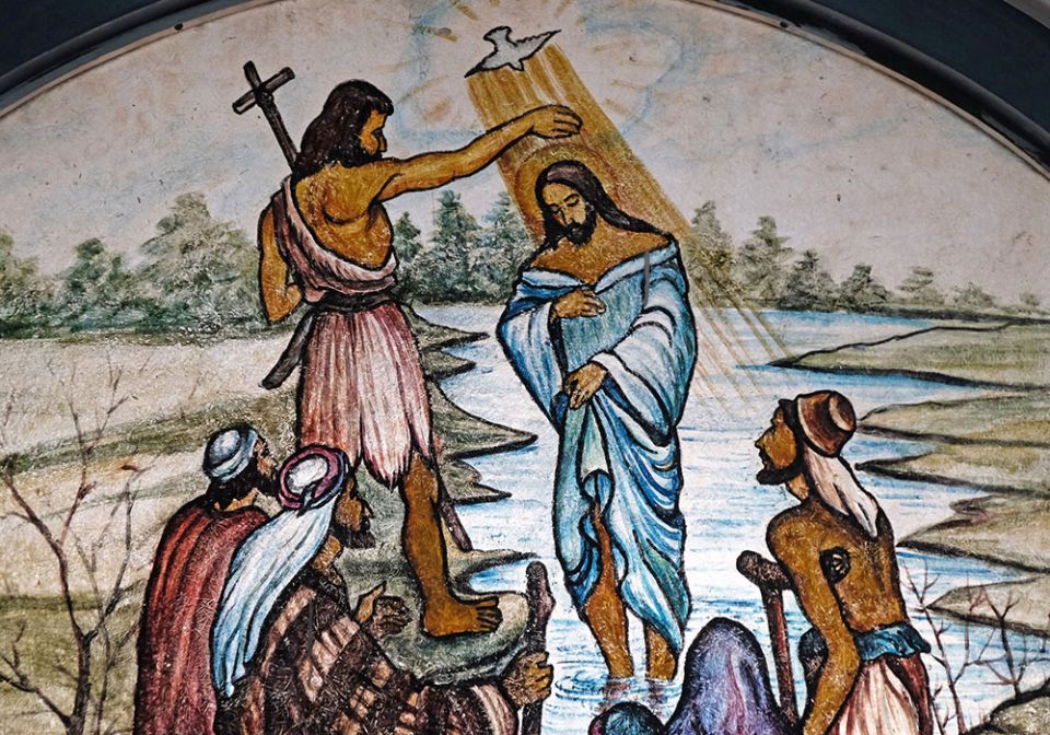 The baptism of the Lord is depicted in stained glass at the Cathedral of Immaculate Heart of Mary and St. Teresa of Calcutta in Baruipur, West Bengal, India. (Dreamstime/Zatletic) The baptism of the Lord is depicted in stained glass at the Cathedral of Immaculate Heart of Mary and St. Teresa of Calcutta in Baruipur, West Bengal, India. (Dreamstime/Zatletic)