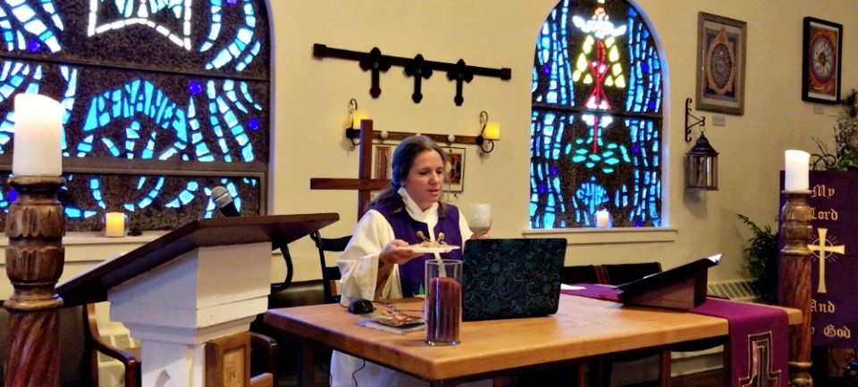 Shanon Sterringer celebrates the Eucharist at Hildegard Haus in Fairport Harbor, Ohio. (Rick Sterringer) Shanon Sterringer celebrates the Eucharist at Hildegard Haus in Fairport Harbor, Ohio. (Rick Sterringer)