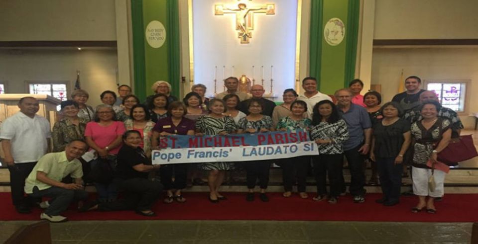 Fr. Emmet Farrell, center, poses with members of St. Michael Catholic Church, in San Diego. As the director of creation care ministry, Farrell promotes Pope Francis' encyclical Laudato Si' within parishes in the Diocese of San Diego, and helps form creati Fr. Emmet Farrell, center, poses with members of St. Michael Catholic Church, in San Diego. As the director of creation care ministry, Farrell promotes Pope Francis' encyclical Laudato Si' within parishes in the Diocese of San Diego, and helps form creati