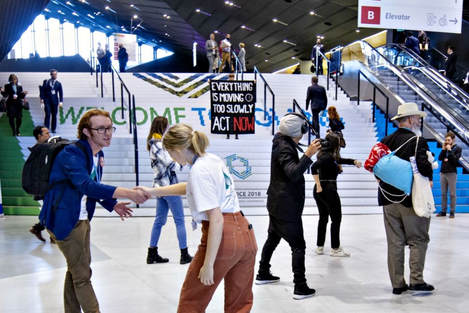 An "Earth Council Flash Mob" calls on negotiators and world leaders to take action on climate change at COP24 in Katowice, Poland, Dec. 2. (Flickr/UNclimatechange)