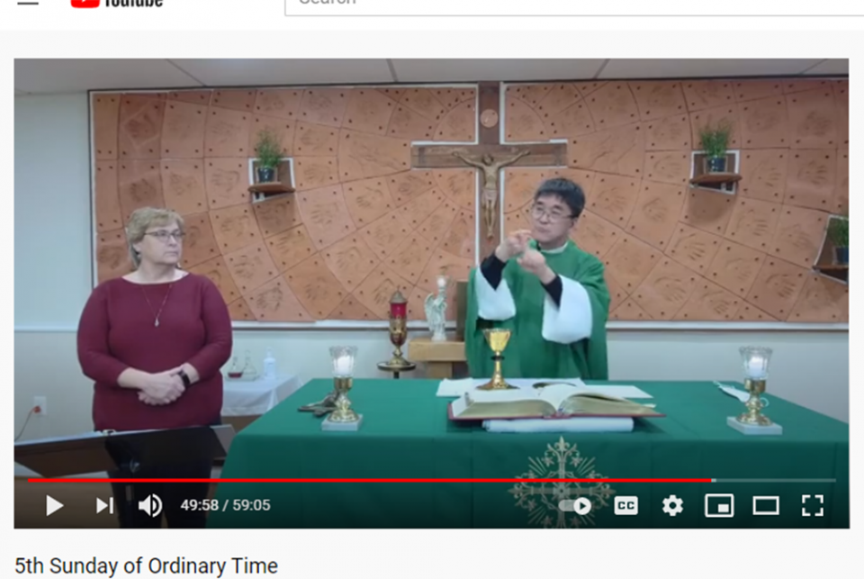 Fr. Min Seo Park signs the Mass in American Sign Language during a livestream Feb 6. Over 800 viewers watched via the Archdiocese of Washington Special Needs Ministry YouTube channel. (Screenshot by Joe Portolano/YouTube) Fr. Min Seo Park signs the Mass in American Sign Language during a livestream Feb 6. Over 800 viewers watched via the Archdiocese of Washington Special Needs Ministry YouTube channel. (Screenshot by Joe Portolano/YouTube)