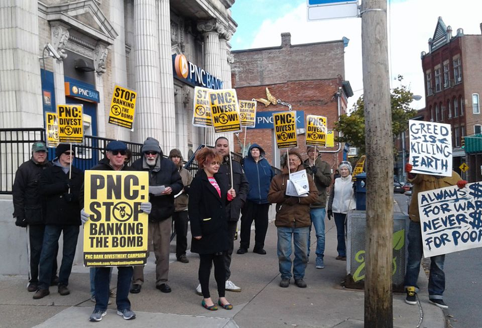 Protesters in Pittsburgh demonstrate against PNC Bank's connection to firms involved in nuclear weapons production. (Paul Dordal)