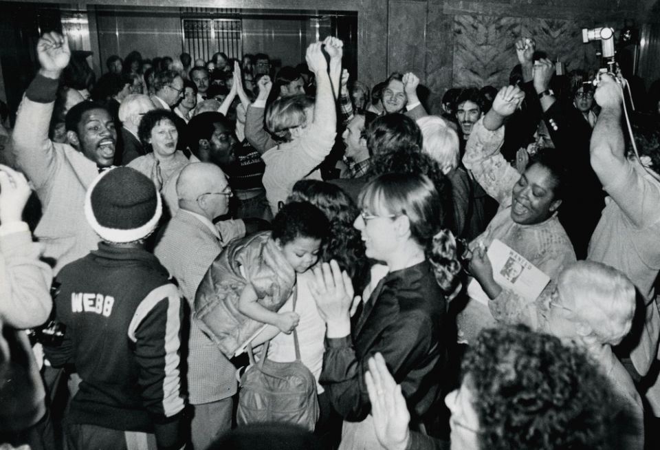 At the Joslyn Art Museum in Omaha, Nebraska, on April 14, 1982, members of Iowa Citizens for Community Improvement hear the news that InterNorth Inc. Board President Willis Strauss agrees to a meeting. (Courtesy of Omaha World Herald)
