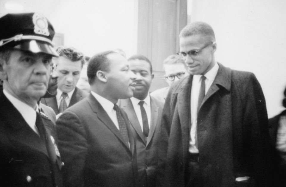 Martin Luther King Jr. speaks to Malcolm X as they wait for a press conference on Capitol Hill, Washington, D.C., March 26, 1964. (Library of Congress/U.S. News & World Report Magazine Photograph Collection/Marion S. Trikosko)