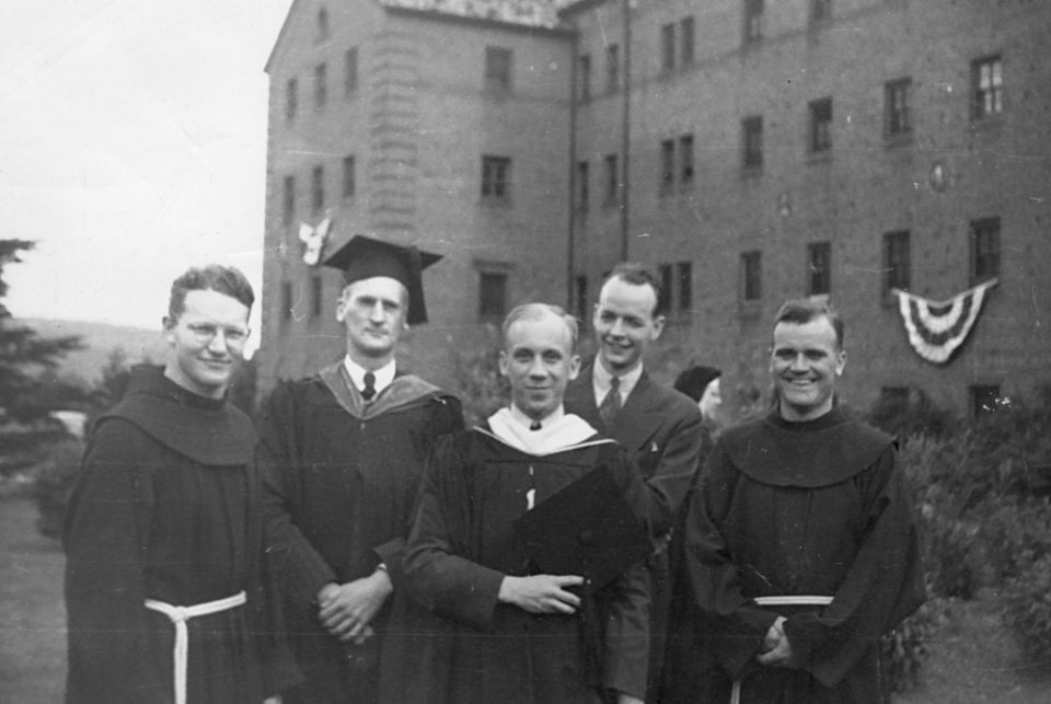 From left: Franciscan Fr. Peter Biasiotto, Lawrence Kenney, Thomas Merton, Dennis Lane and Franciscan Fr. Gabriel Naughton in front of Devereux Hall, where Merton lived while at St. Bonaventure's College in Allegany, New York (F. Donald Kenny)