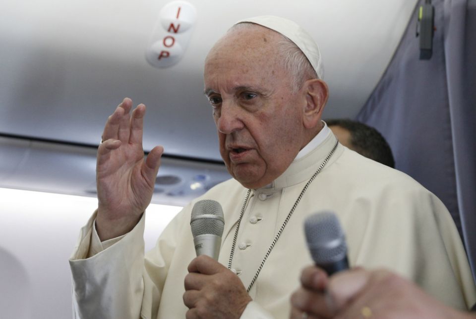 Pope Francis answers questions from journalists aboard his flight from Sibiu, Romania, to Rome June 2. (CNS/Paul Haring) Pope Francis answers questions from journalists aboard his flight from Sibiu, Romania, to Rome June 2. (CNS/Paul Haring)
