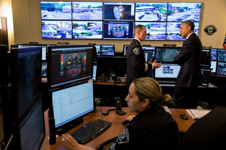 President Barack Obama, with Camden County Metro Police Chief John Scott Thomson, takes a tour of the Real Time Tactical Operational Intelligence Center at Camden County Police Headquarters in Camden, New Jersey, May 18, 2015. (Obama White House Archives) President Barack Obama, with Camden County Metro Police Chief John Scott Thomson, takes a tour of the Real Time Tactical Operational Intelligence Center at Camden County Police Headquarters in Camden, New Jersey, May 18, 2015. (Obama White House Archives)