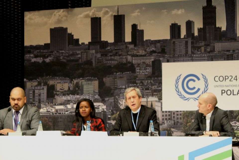 Msgr. Bruno-Marie Duffé, second from right, speaks at a press conference Dec. 12 in Katowice, Poland. With him are, from left, Joseph Sapati Moeono-Kolio, Mercy Chirambo and Neil Thorns. (NCR photo/Brian Roewe) Msgr. Bruno-Marie Duffé, second from right, speaks at a press conference Dec. 12 in Katowice, Poland. With him are, from left, Joseph Sapati Moeono-Kolio, Mercy Chirambo and Neil Thorns. (NCR photo/Brian Roewe)