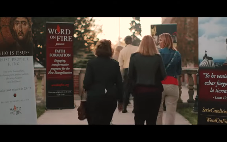 People are seen walking to a Word on Fire event in a promotional video on the Word on Fire Institute website. (NCR screengrab/YouTube/Word on Fire Institute) People are seen walking to a Word on Fire event in a promotional video on the Word on Fire Institute website. (NCR screengrab/YouTube/Word on Fire Institute)