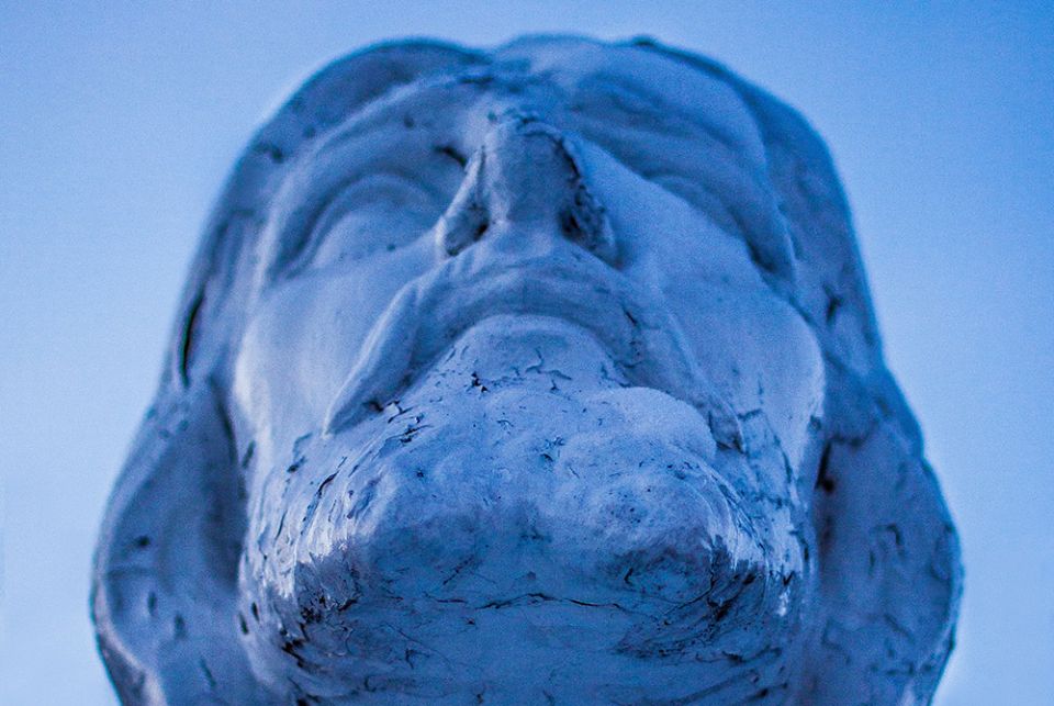 Photo illustration of a sculpture of Jesus (Unsplash/Scott Rodgerson)