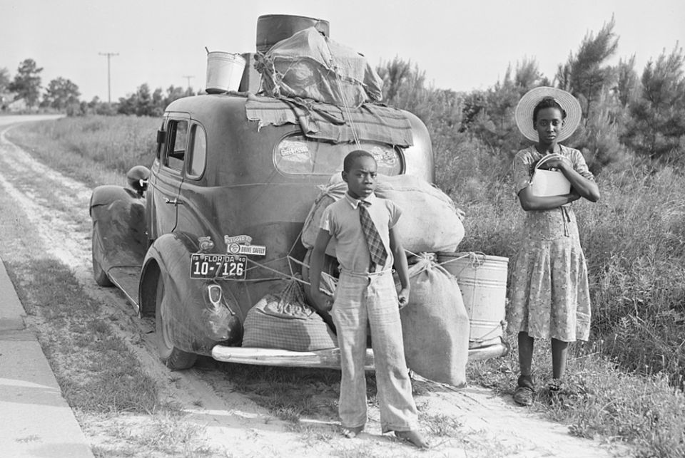 A group of Florida migrants are photographed in 1940 near Shawboro, North Carolina, on their way to Cranberry, New Jersey, to pick potatoes. (Library of Congress/FSA-OWI Collection/Jack Delano) A group of Florida migrants are photographed in 1940 near Shawboro, North Carolina, on their way to Cranberry, New Jersey, to pick potatoes. (Library of Congress/FSA-OWI Collection/Jack Delano)