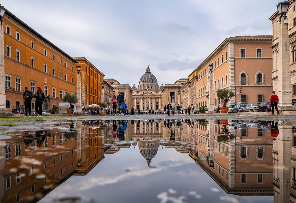 St. Peter's Basilica at the Vatican is seen from a street in Rome. (Unsplash/Shai Pal)