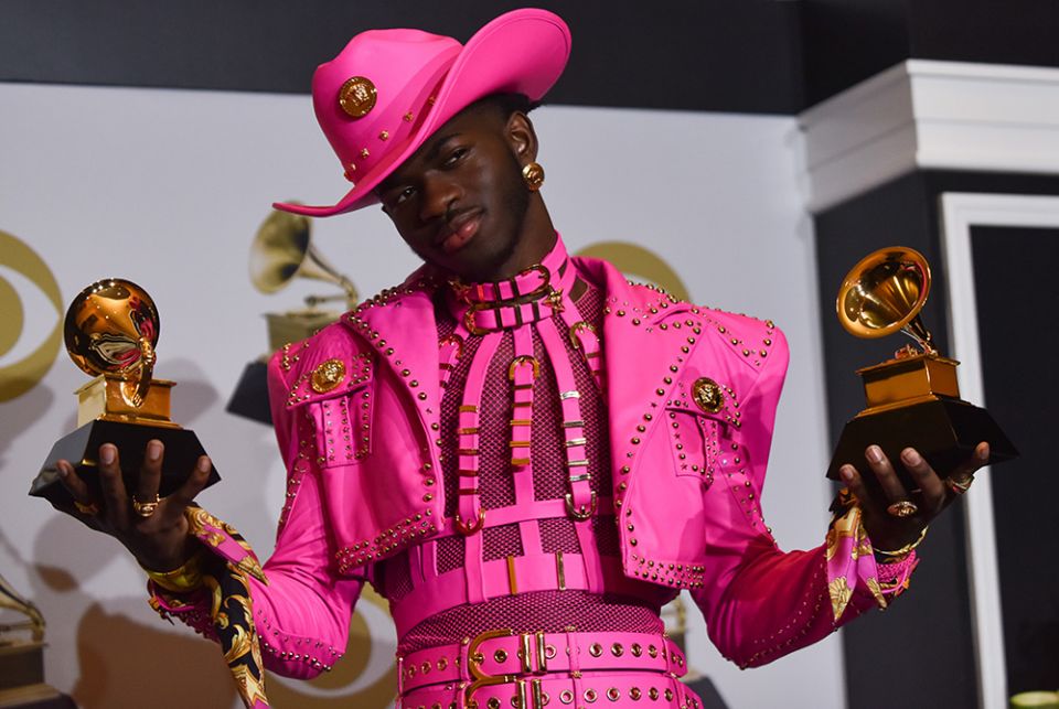 Lil Nas X appears backstage with his awards for Best Pop Duo/Group Performance for "Old Town Road" and Best Music Video for "Old Town Road (Official Movie)," during the 62nd annual Grammy Awards held at Staples Center Jan. 26, 2020, in Los Angeles. (Newsc Lil Nas X appears backstage with his awards for Best Pop Duo/Group Performance for "Old Town Road" and Best Music Video for "Old Town Road (Official Movie)," during the 62nd annual Grammy Awards held at Staples Center Jan. 26, 2020, in Los Angeles. (Newsc