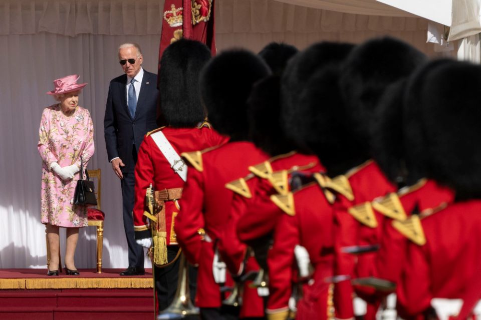 U.S. President Joe Biden and Britain's Queen Elizabeth II stand in front of the Royal Guard at Windsor Castle June 13, 2021. (CNS/pool via Reuters/David Rose)