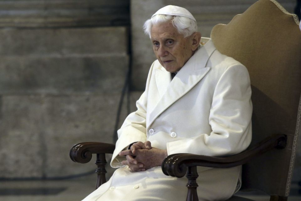 Pope Emeritus Benedict XVI sits in St. Peter's Basilica on Dec. 8, 2015. A long-awaited report on sexual abuse faulted his handling of four cases. (AP/Gregorio Borgia)