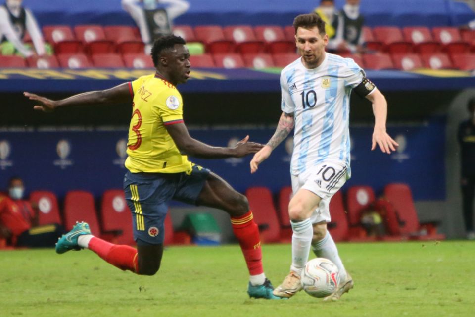 D. Sanchez of Colombia, left, and Lionel Messi of Argentina during the Copa América 2021 July 6 semi-final football match between Argentina and Colombia at Estadio Nacional Mane Garrincha in Brasilia, Brazil. (Newscom/ZUMA Press/Panoramic)  