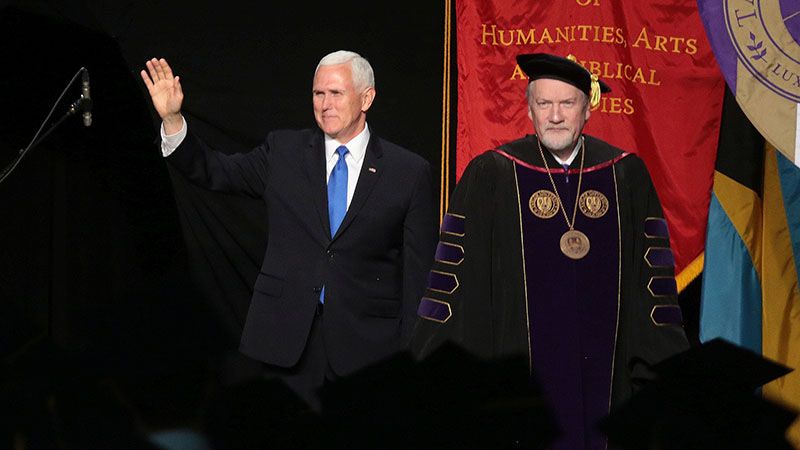 Vice President Mike Pence, left, attends the 2019 Taylor University commencement at the invitation of President Paul Lowell Haines, right. (RNS/Courtesy of Taylor University)