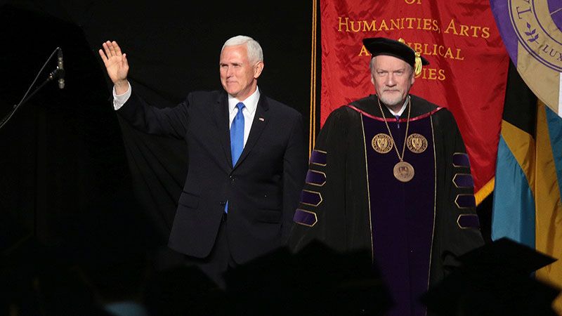 Vice President Mike Pence, left, attends the 2019 Taylor University commencement at the invitation of President Paul Lowell Haines, right. (RNS/Courtesy of Taylor University) Vice President Mike Pence, left, attends the 2019 Taylor University commencement at the invitation of President Paul Lowell Haines, right. (RNS/Courtesy of Taylor University)