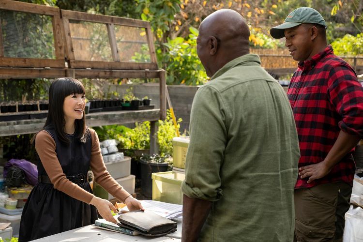 Marie Kondo, left, in a scene from her new Netflix show. (Photo by Adam Rose/Netflix © 2021)
