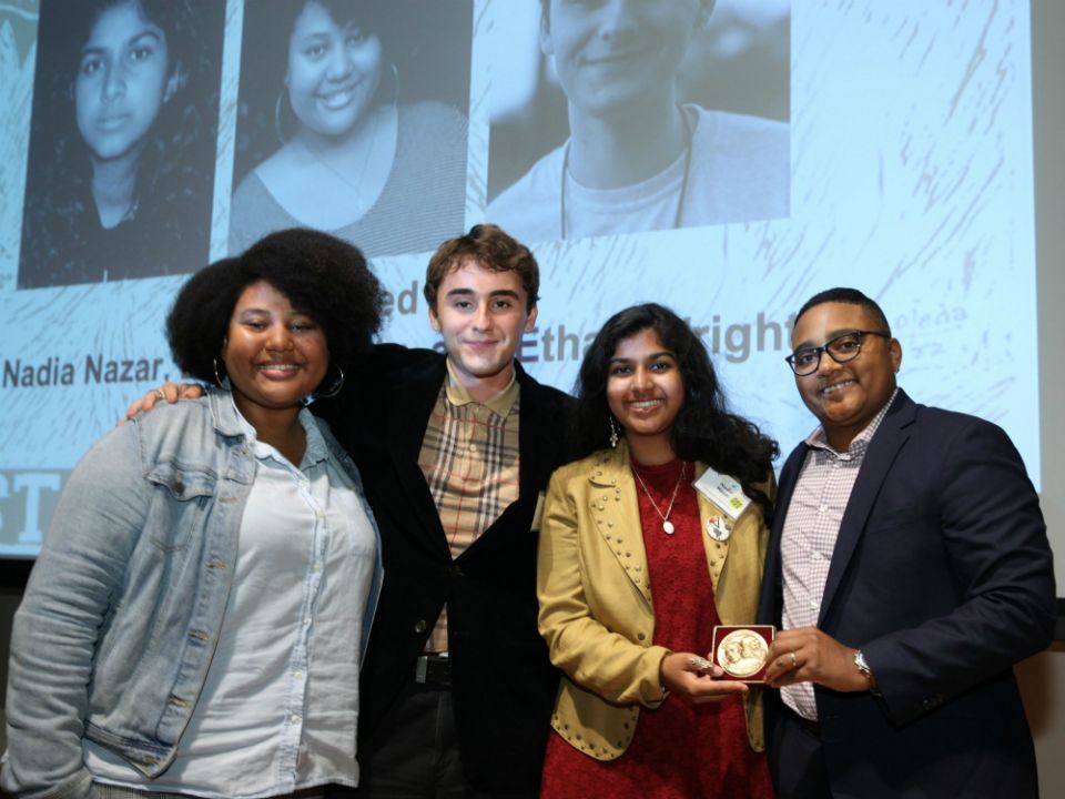 From left, Elsa Mengistu, Ethan Wright and Nadia Nazar from Zero Hour with event emcee Erica Smiley, after the group received its Letelier-Moffitt Human Rights Award (Institute for Policy Studies/Rick Reinhard) From left, Elsa Mengistu, Ethan Wright and Nadia Nazar from Zero Hour with event emcee Erica Smiley, after the group received its Letelier-Moffitt Human Rights Award (Institute for Policy Studies/Rick Reinhard)