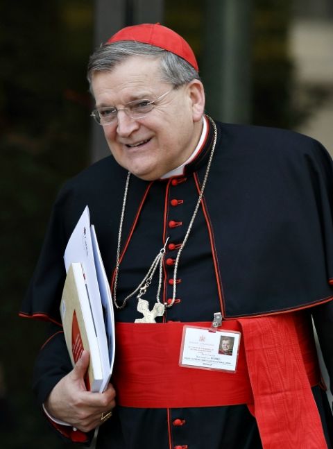 Cardinal Raymond Burke leaves the morning session of the extraordinary Synod of Bishops on the family at the Vatican Oct. 7, 2014. (CNS/Paul Haring)