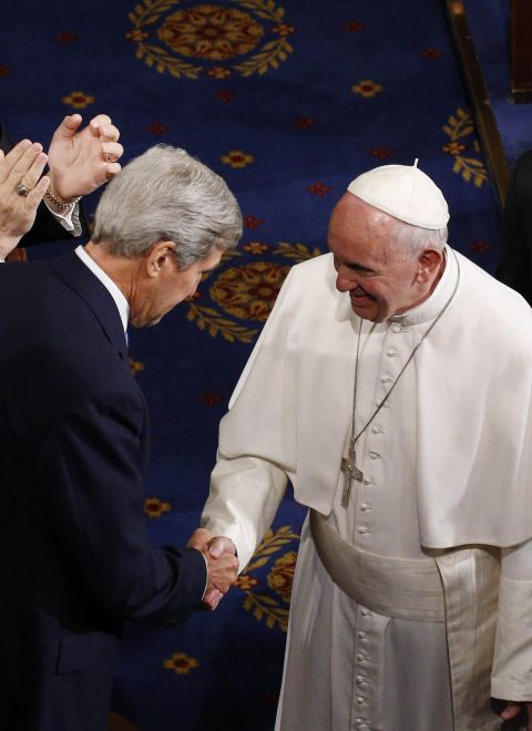 Pope Francis shakes hands with then-U.S. Secretary of State John Kerry as the pope enters the House of Representatives Chamber to address a joint meeting of Congress at the U.S. Capitol in Washington Sept. 24, 2015. (CNS/Paul Haring) Pope Francis shakes hands with then-U.S. Secretary of State John Kerry as the pope enters the House of Representatives Chamber to address a joint meeting of Congress at the U.S. Capitol in Washington Sept. 24, 2015. (CNS/Paul Haring)