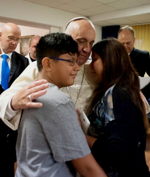 Pope Francis visits patients at the Villa Speranza hospice, which is connected to Gemelli Hospital, in Rome Sept. 16, 2016. The visit was part of the pope's series of Friday works of mercy during the Holy Year. (CNS/L'Osservatore Romano, handout) Pope Francis visits patients at the Villa Speranza hospice, which is connected to Gemelli Hospital, in Rome Sept. 16, 2016. The visit was part of the pope's series of Friday works of mercy during the Holy Year. (CNS/L'Osservatore Romano, handout)