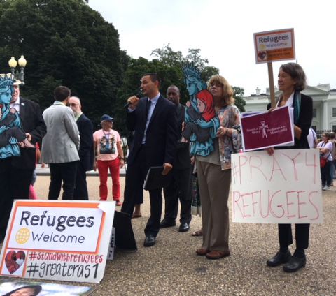 Catholics join other religious organizations and groups near the White House in Washington Sept. 12 urging the administration to allow 75,000 refugees into the country next fiscal year. (CNS/Rhina Guidos) Catholics join other religious organizations and groups near the White House in Washington Sept. 12 urging the administration to allow 75,000 refugees into the country next fiscal year. (CNS/Rhina Guidos)