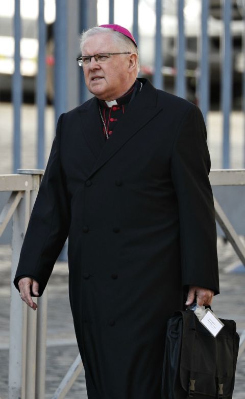 Archbishop Mark Coleridge of Brisbane, Australia, leaves the morning session of the Vatican meeting on the protection of minors Feb. 22. (CNS/Paul Haring)