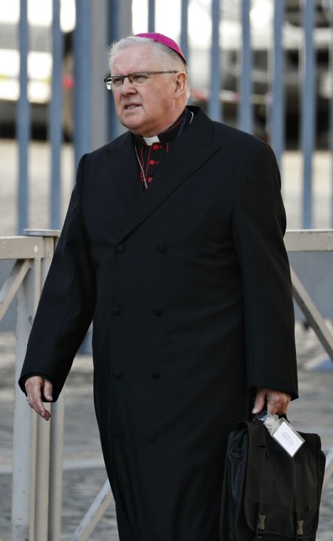 Archbishop Mark Coleridge of Brisbane, Australia, leaves the morning session of the Vatican meeting on the protection of minors Feb. 22. (CNS/Paul Haring) Archbishop Mark Coleridge of Brisbane, Australia, leaves the morning session of the Vatican meeting on the protection of minors Feb. 22. (CNS/Paul Haring)