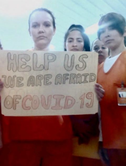 Migrants detained in an Immigration and Customs Enforcement facility in Basile, Louisiana, display signs April 3 related to the coronavirus disease. (CNS/Handout via Reuters) Migrants detained in an Immigration and Customs Enforcement facility in Basile, Louisiana, display signs April 3 related to the coronavirus disease. (CNS/Handout via Reuters)